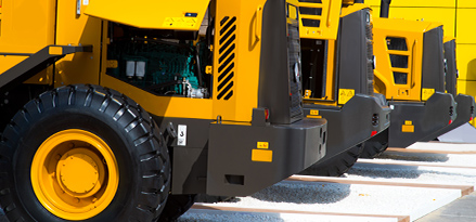 big yellow wheel tractor