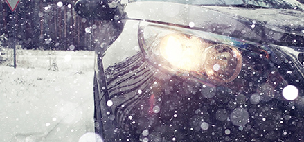 front car headlight in snow