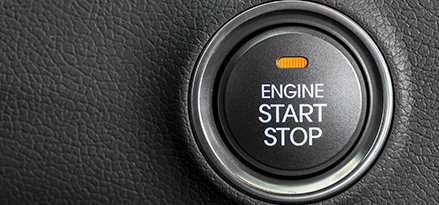 Engine start stop button